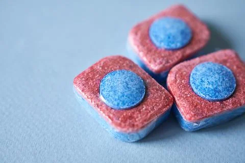 Detergent for dishwashers in tablet form. Stock Photos