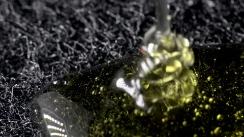 Detergent in the form of a gel flows onto the sponge. macro photography. Stock Footage 228121297