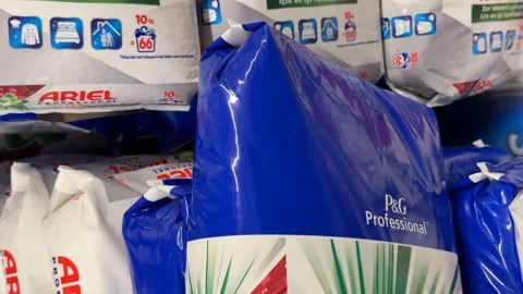 Detergent packaging with bold branding and cleaning features in vibrant color Stock Footage 330927494