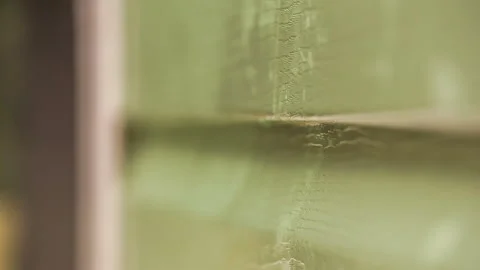 A detergent is sprayed onto the siding Stock Footage 136677015