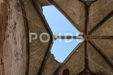 Deterioration of the Gothic vaults of the abandoned convent of San Antonio de Stock Photos