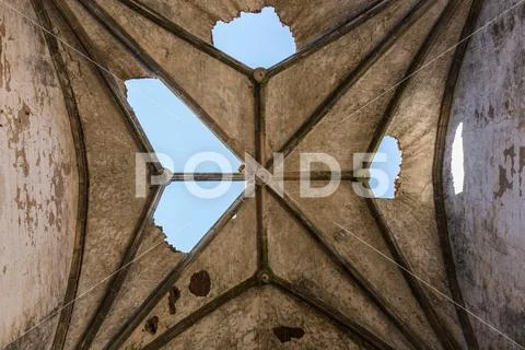 Deterioration of the Gothic vaults of the abandoned convent of San Antonio de Stock Photos