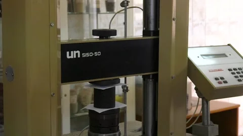 Determination of compressive strength, tensile strength at splitting Stock Footage 104943087