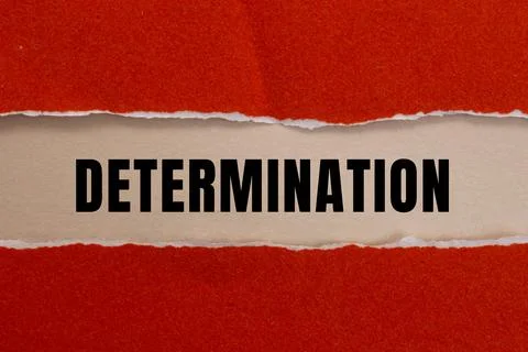 Determination message written on ripped torn paper background. Conceptual D.. Stock Photos