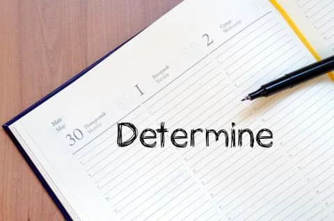 Determine write on notebook Stock Photos