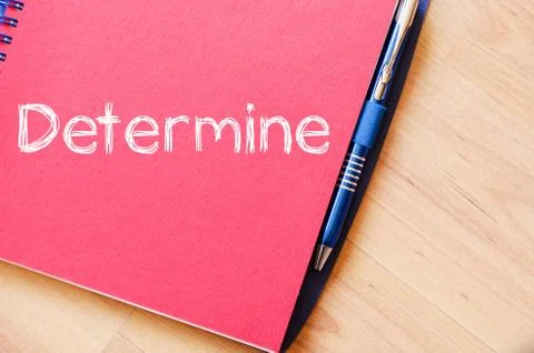 Determine write on notebook Stock Photos