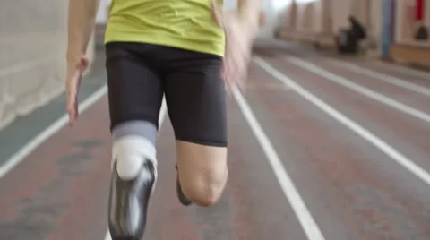 Determined Amputee Athlete Running a Race Stock Footage 62057533