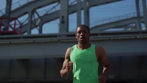 Determined athlete preparing for marathon Stock Footage 117065221