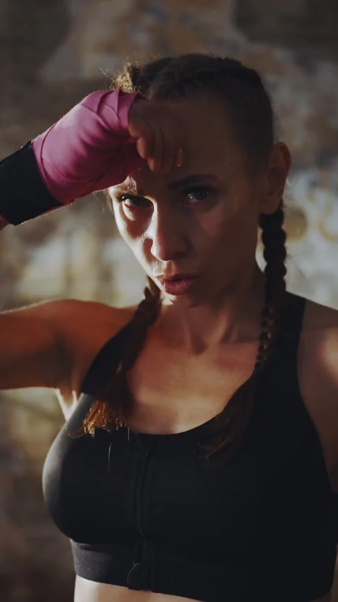 Determined female boxer after training Stock Footage 341681903