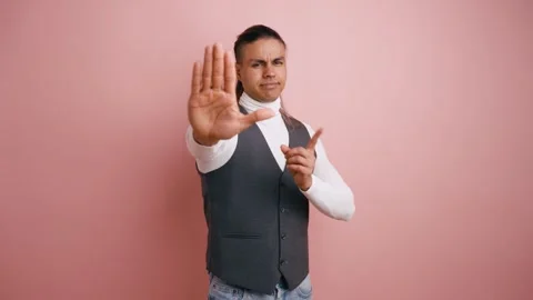 Determined man making a stop gesture with his hand Stock Footage 335275092