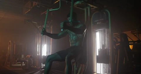 Determined man working out with exercise equipment Stock Footage 116358292