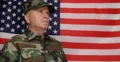 Determined Military Soldier Looking Fixed Stay Stood Position Honoring USA Flag 4k or 4k+ Resolution
