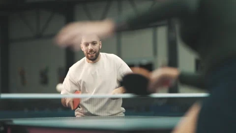 Determined table tennis player hitting ball Stock Footage 327893723