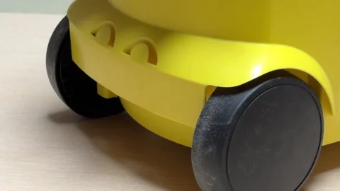 Determined Vacuum Ignites to Clean Producing a Roaring Whir and Sudden Click Stock Footage 328797937