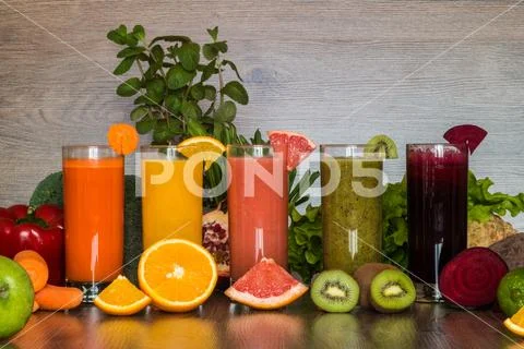 Detox diet. Healthy eating. Different colorful fresh juices, vegetables and.. Stock Photos