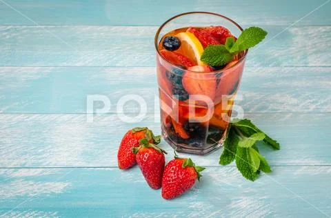Detox fruit infused flavored water. Stock Photos