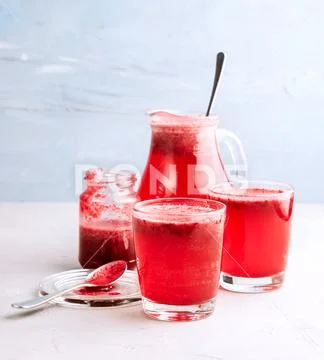 Detox lemonade in glasses with berries Stock Photos