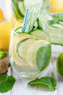Detox refreshing sassy water with cucumber, ginger, mint and lemon in glasses, Stock Photos
