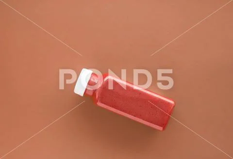 Detox superfood smoothie bottle for weight loss cleanse on.brown background, Stock Photos
