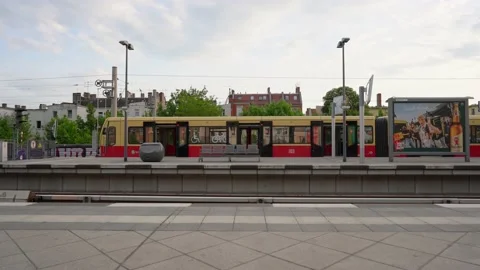 Deutsche Bahn, S-Bahn Train departing Station in Berlin. Public Transport in Stock Footage 195820258