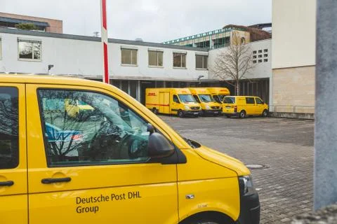 Deutsche Post DHL Group auto fleet on a car parking in Bad Kissingen, Germany 스톡 사진