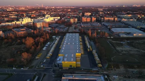 Deutsche Post logistics center with delivery vans. Nice aerial view drone Stock Footage 322930005