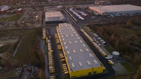 Deutsche Post logistics center with delivery vans. Great aerial view drone Stock Footage 322930011