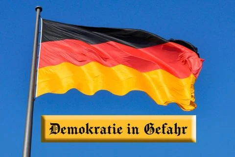  Deutschlandflagge mit Demokratie in Gefahr Deutschlandflagge mit Demokrat... Stock Photos