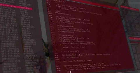 Dev noting at desk with screen causing red panel appearing with scrolling code, Stockbeeldmateriaal 331634311