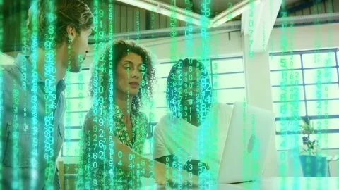 Dev team at laptop, woman gesturing causing green code overlay obscuring team, Stock Footage 333035167