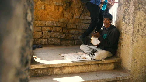 Devarayana Durga, Karnataka , India - January 23, 2020 : Street singer at a temp Stock Footage 147371401