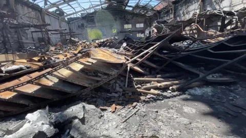 Devastating aftermath of a building fire with smoldering ruins Video stock 320815693