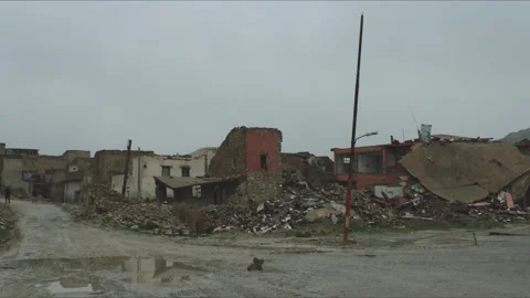 Devastating aftermath of war in a destroyed town Stock Footage 330568193