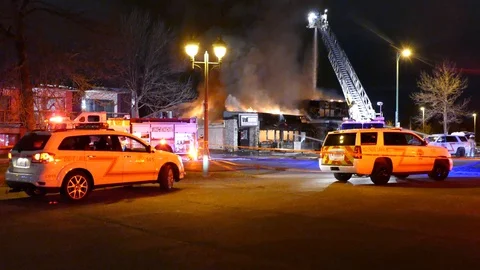 Devastating and surreal night of a fire incident during full moon Video stock 129987848