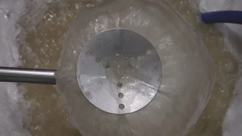 Devastating bowl and march of loading in the press with marc pump. camera above Stock Footage 153813491