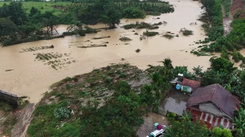 Devastating floodwaters sweeping through rural riverside homes… 🌊🏚️ 스톡 동영상 342781619