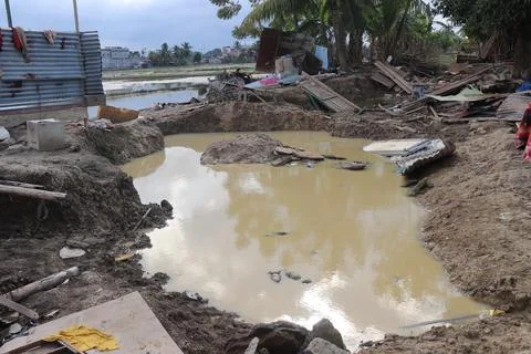 Devastation and Debris in a Disaster stricken Village Stock Photos