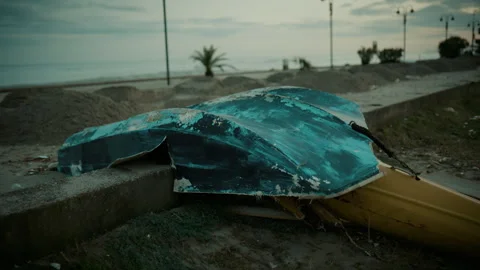 Devastation from climate change: storm destroys a fishing boat Vidéo 336238238