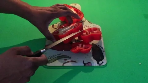 Deveining a red bell pepper on a cutting board Video stock 42281740