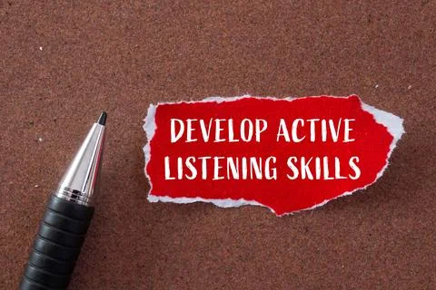 Develop active listening skills message written on ripped torn red paper pi.. Stock Photos