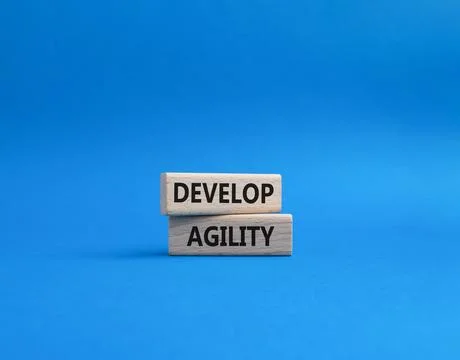 Develop agility symbol. Concept word Develop agility on wooden blocks. Beau.. 写真素材