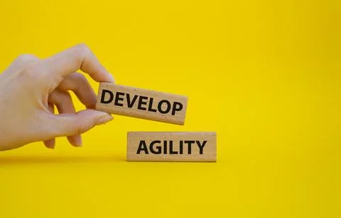 Develop agility symbol. Concept word Develop agility on wooden blocks. Beau.. 写真素材