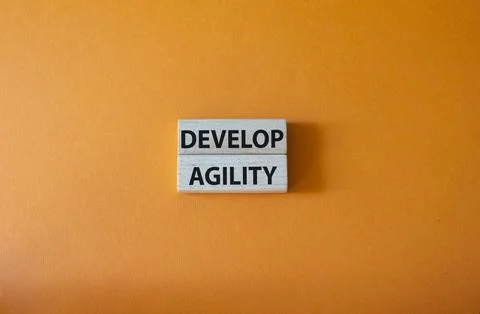 Develop agility symbol. Concept word Develop agility on wooden blocks. Beau.. 写真素材