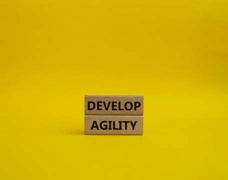Develop agility symbol. Concept word Develop agility on wooden blocks. Beau.. 写真素材