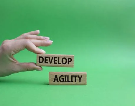 Develop agility symbol. Concept word Develop agility on wooden blocks. Beau.. 写真素材
