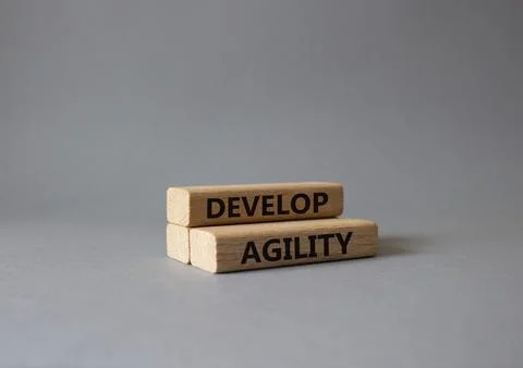 Develop agility symbol. Concept word Develop agility on wooden blocks. Beau.. 写真素材