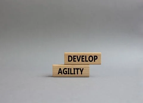 Develop agility symbol. Concept word Develop agility on wooden blocks. Beau.. 写真素材