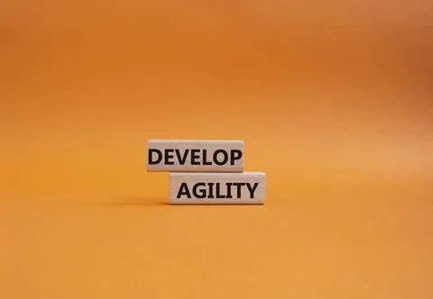Develop agility symbol. Concept word Develop agility on wooden blocks. Beau.. 写真素材