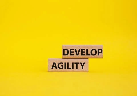 Develop agility symbol. Concept word Develop agility on wooden blocks. Beau.. 写真素材