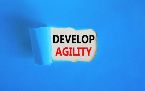 Develop agility symbol. Concept words Develop agility on beautiful white pa.. Stock Photos